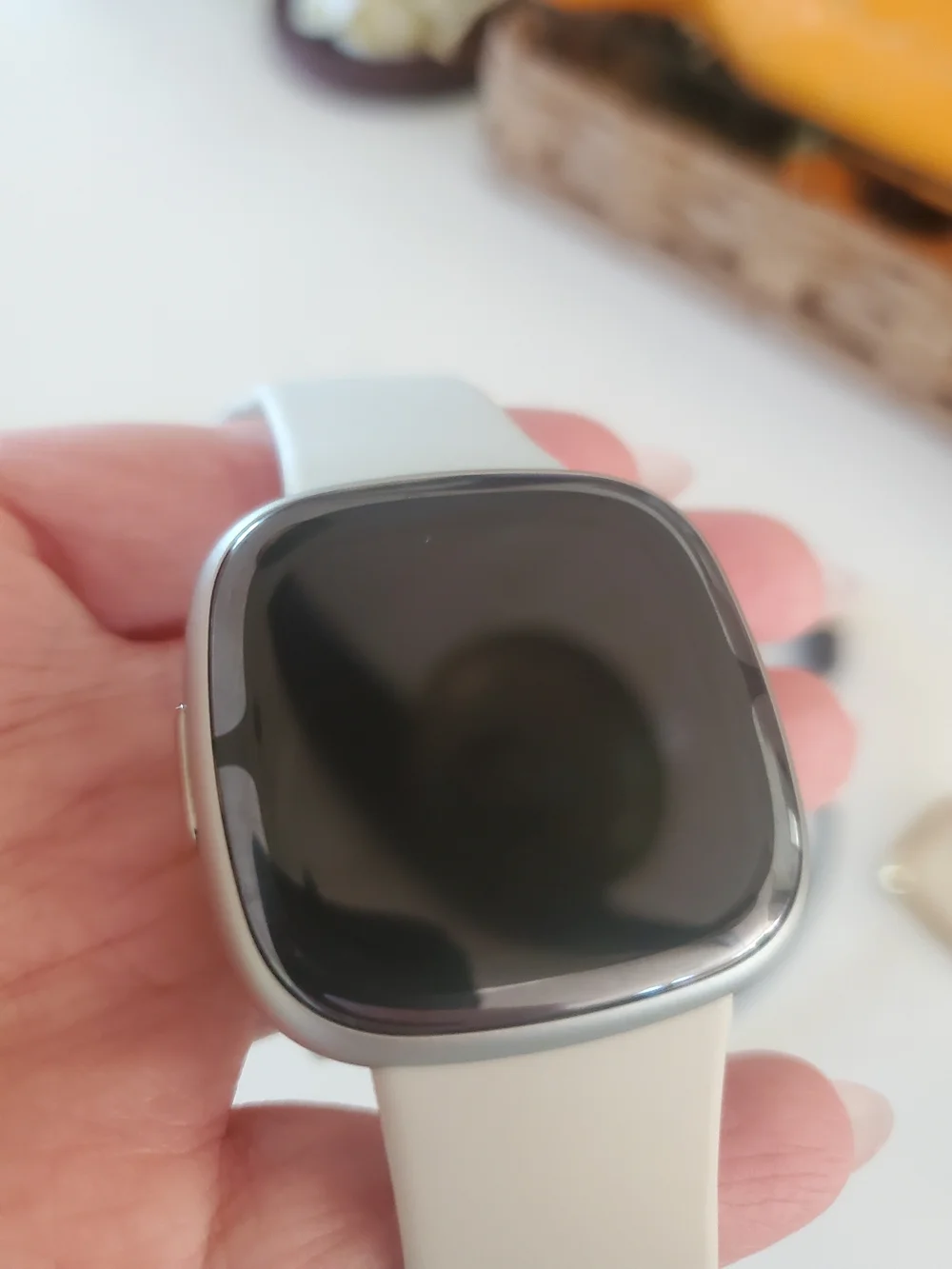 Fitbit Sense 2 smartwatch With Charger And Gold Screen Protector.